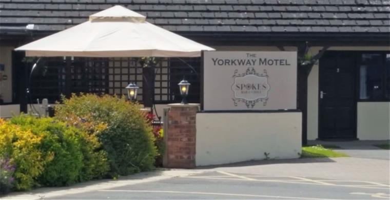 The Yorkway Motel Sign in front of building